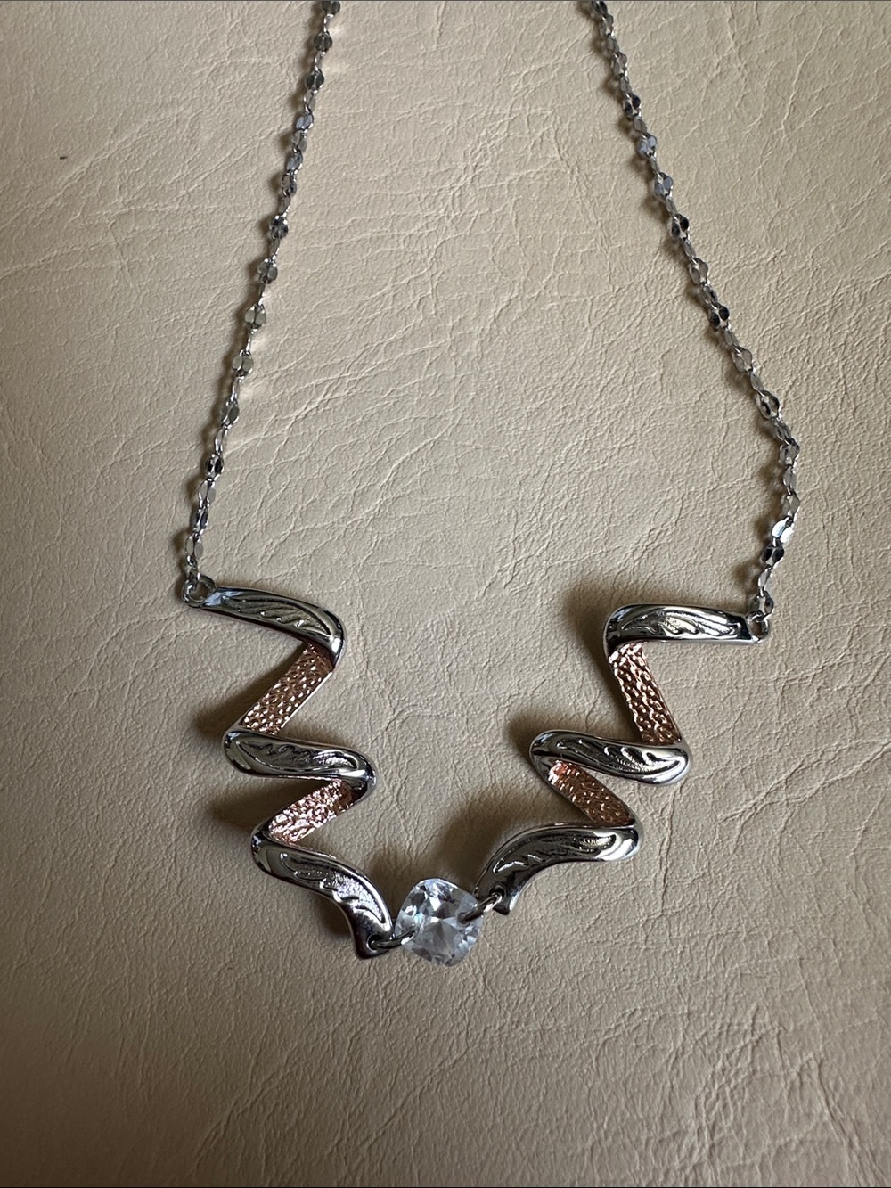 Silver and Rose Gold Wave Pendant Necklace with Clear Stone